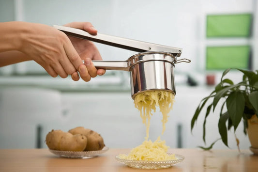 Triturador de patatas y colador de comida para bebés de acero inoxidable Cuisinox con 3 discos intercambiables